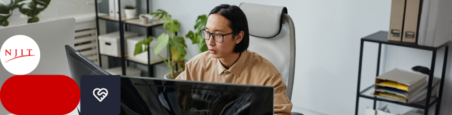 Person working at a desk with multiple monitors and office decor, NJIT and heart logos visible.

